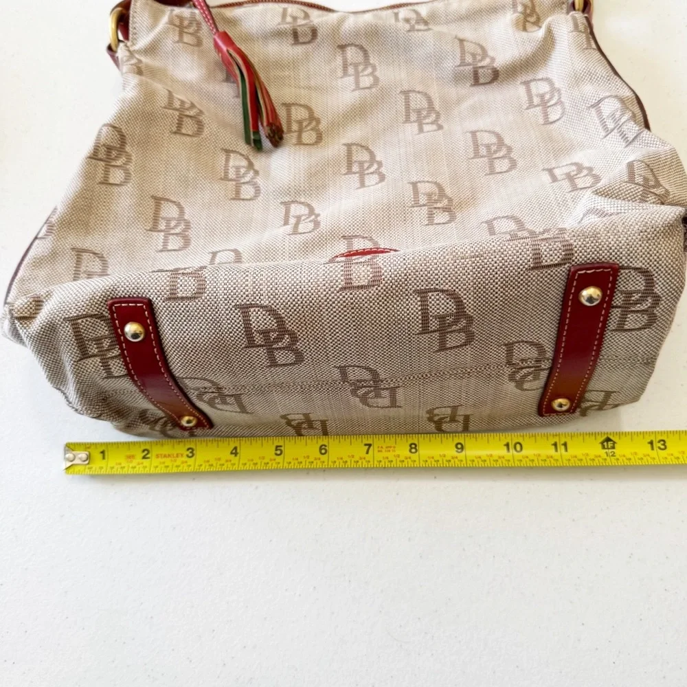 Dooney & Bourke Jacquard Logo Cream Red Tassel Hobo Bag